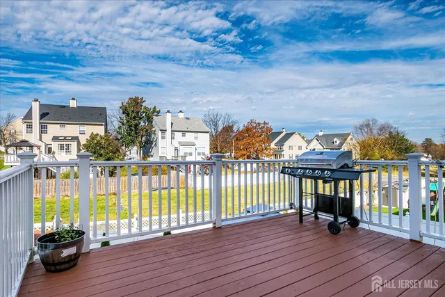an aerial view of a house with a street