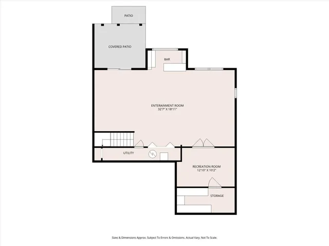 a kitchen with cabinets stainless steel appliances and wooden floor