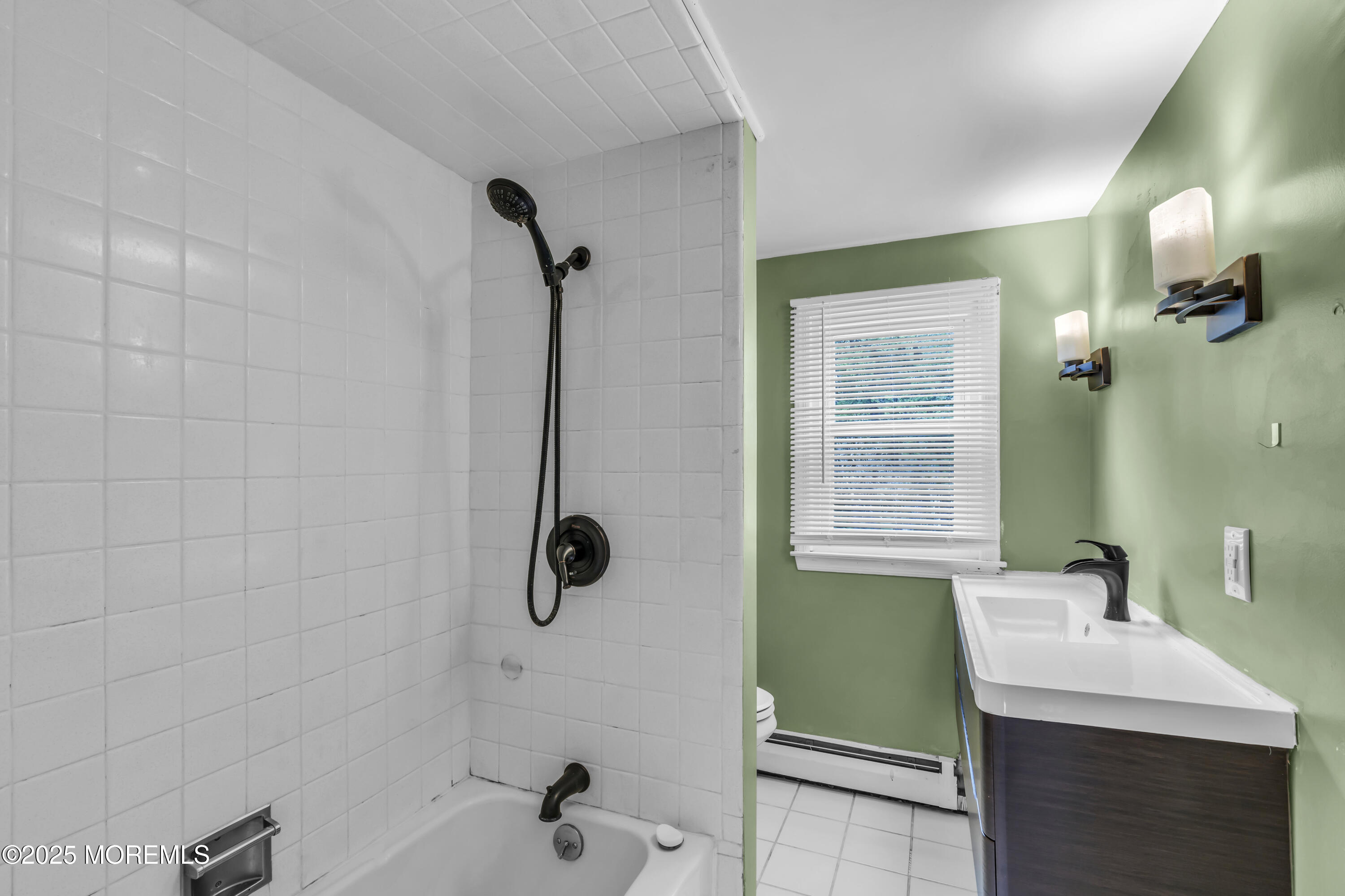 2 Schiverea Avenue Freehold, NJ 07728 - Photo 24 of 36 a bathroom with a sink a toilet and shower