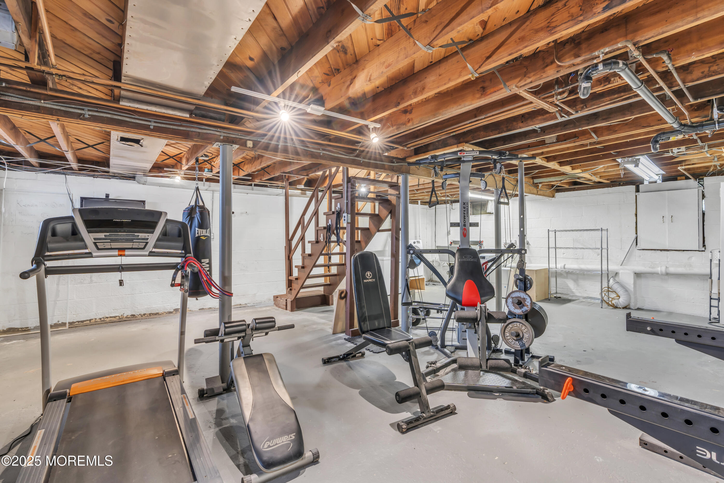 2 Schiverea Avenue Freehold, NJ 07728 - Photo 27 of 36 a view of a room with gym equipment