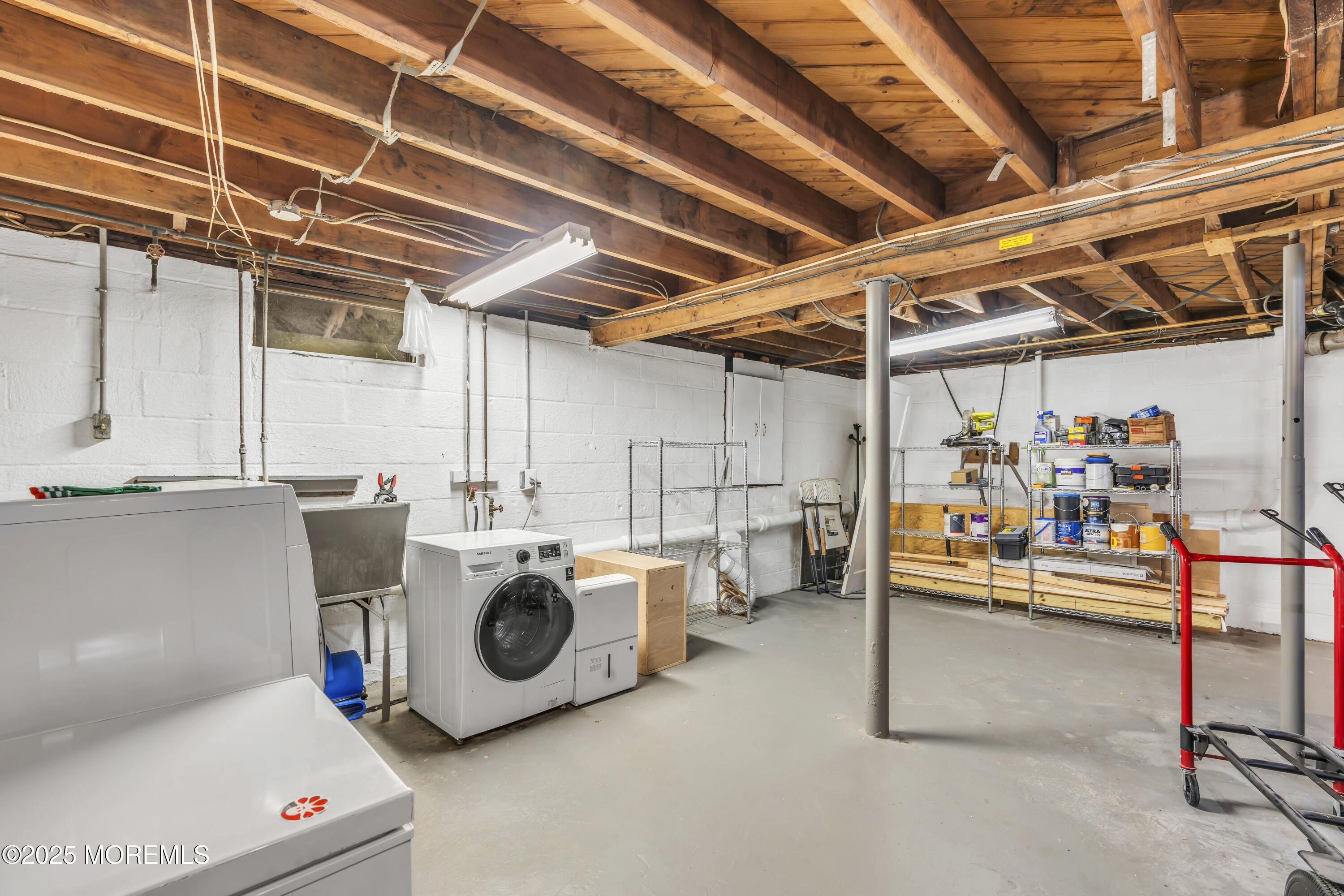 2 Schiverea Avenue Freehold, NJ 07728 - Photo 30 of 36 a utility room with dryer and washer