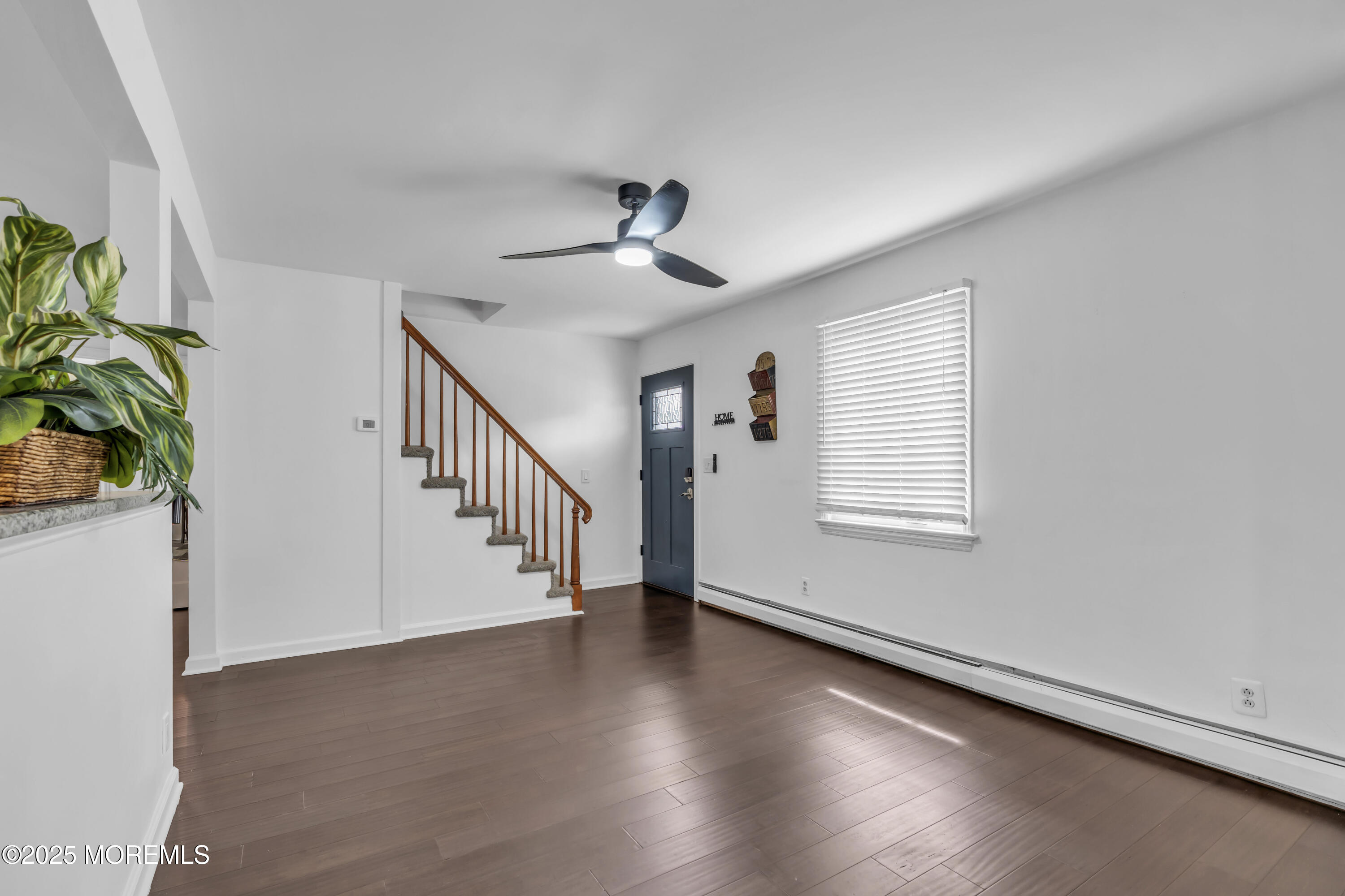 2 Schiverea Avenue Freehold, NJ 07728 - Photo 4 of 36 a view of an entryway with wooden floor