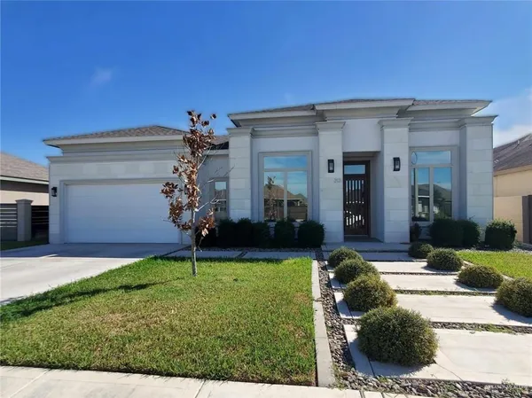 a house view with a garden space