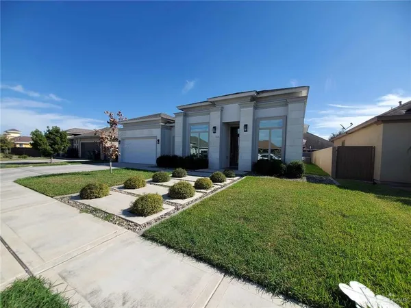 a view of a house with backyard porch and furniture