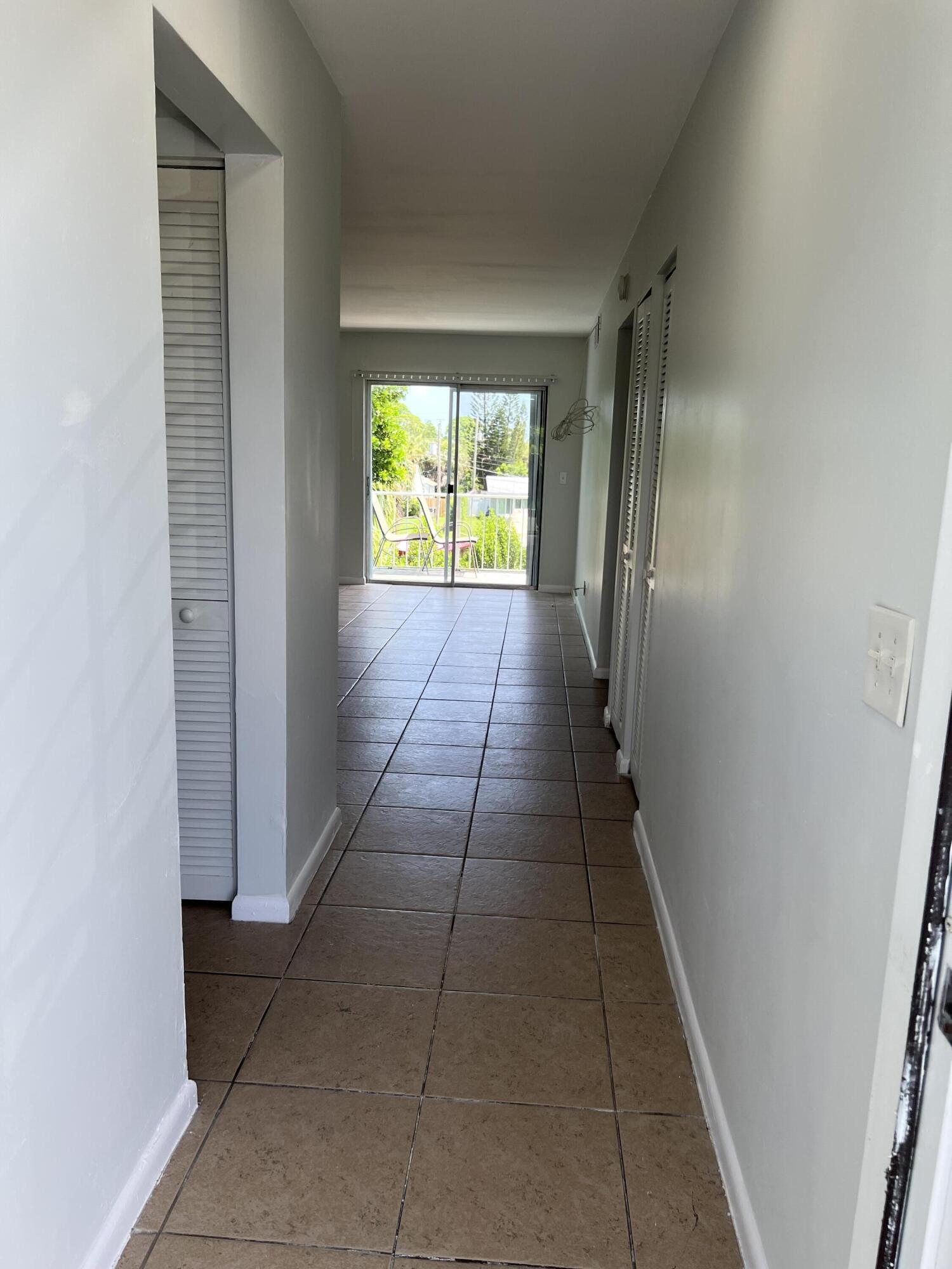 1887 Juno Road, Unit 1 North Palm Beach, FL 33408 - Photo 6 of 27 IMG_7388