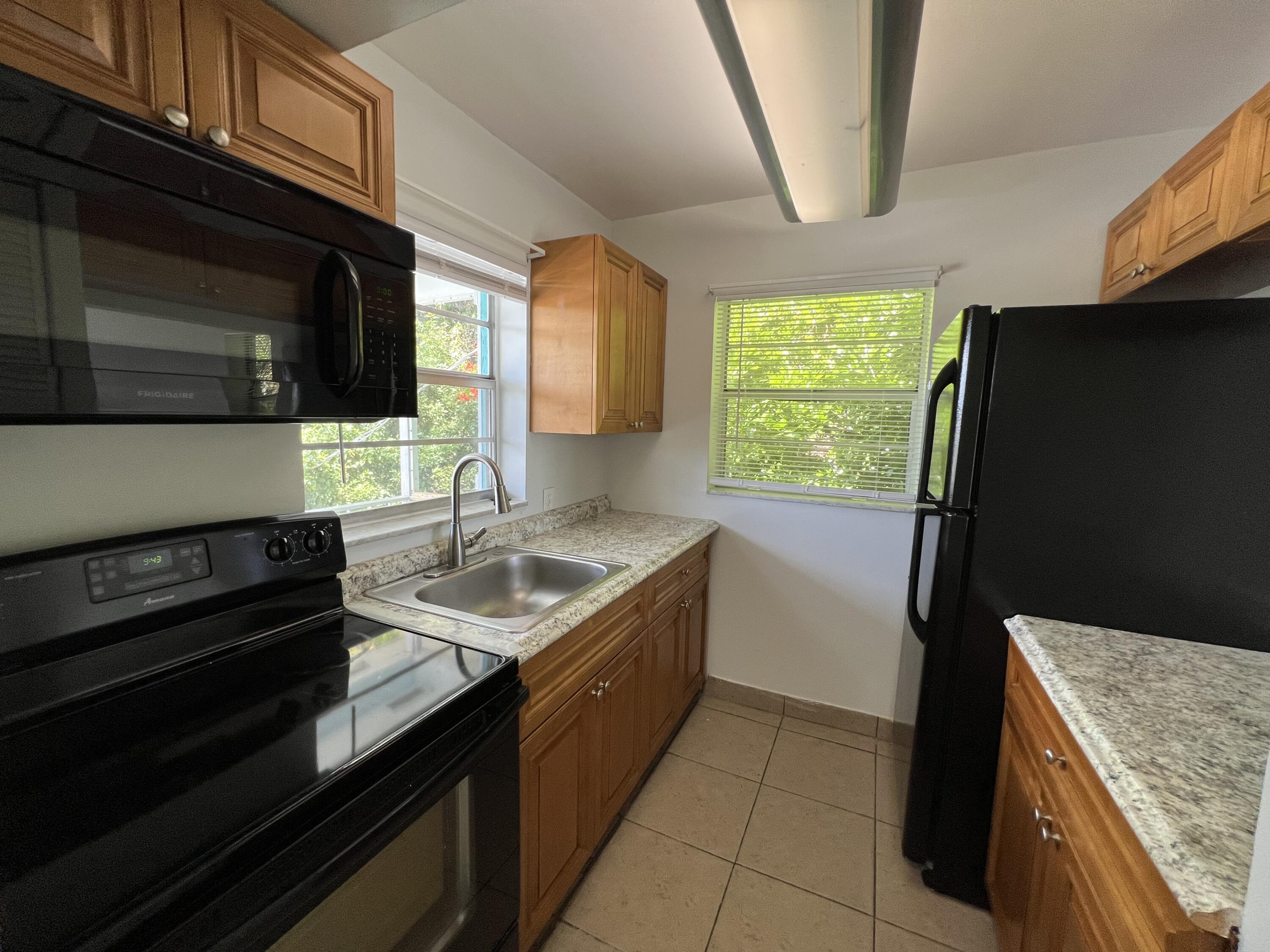 1887 Juno Road, Unit 1 North Palm Beach, FL 33408 - Photo 7 of 27 IMG_7389