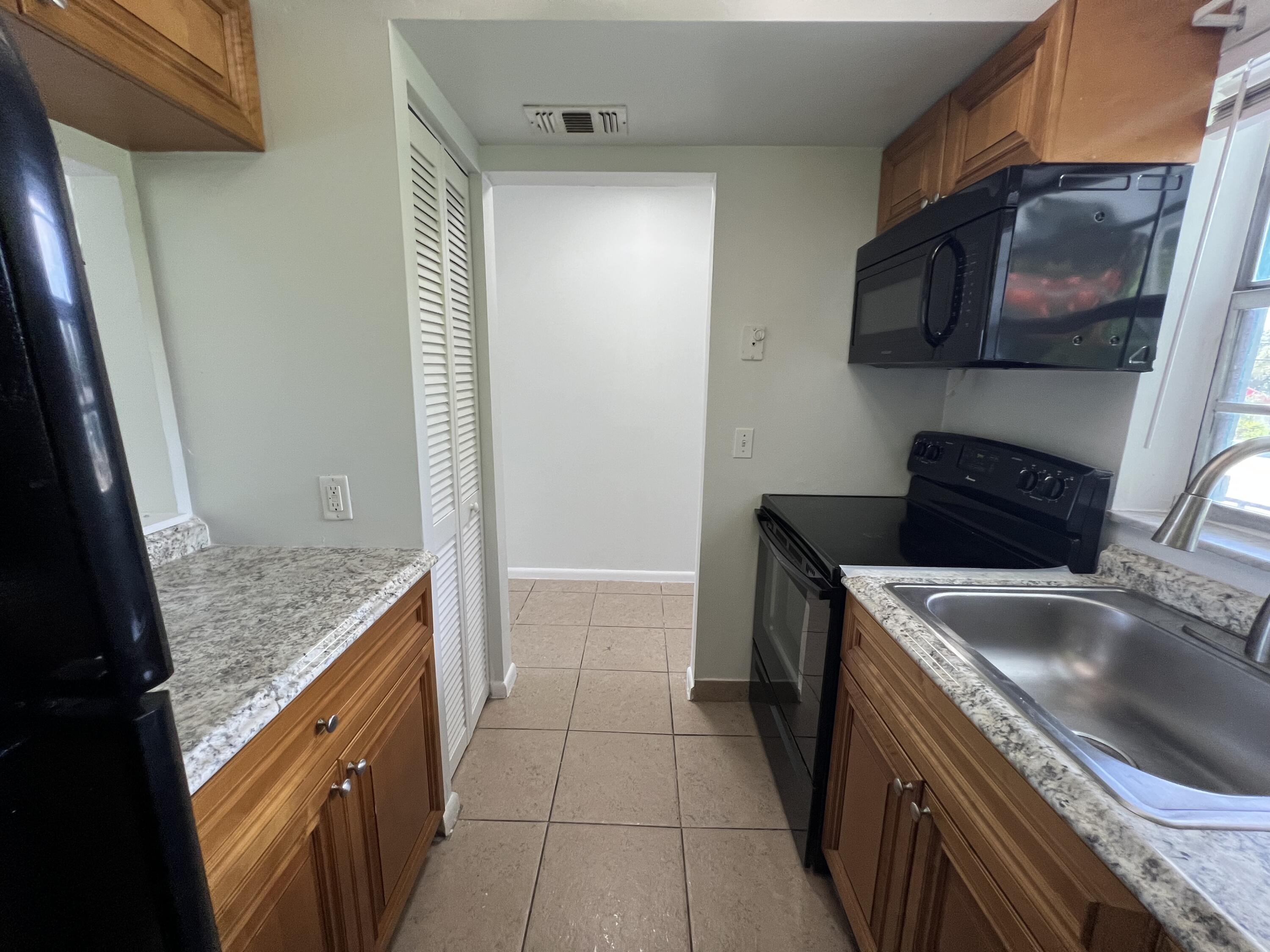 1887 Juno Road, Unit 1 North Palm Beach, FL 33408 - Photo 9 of 27 IMG_7399