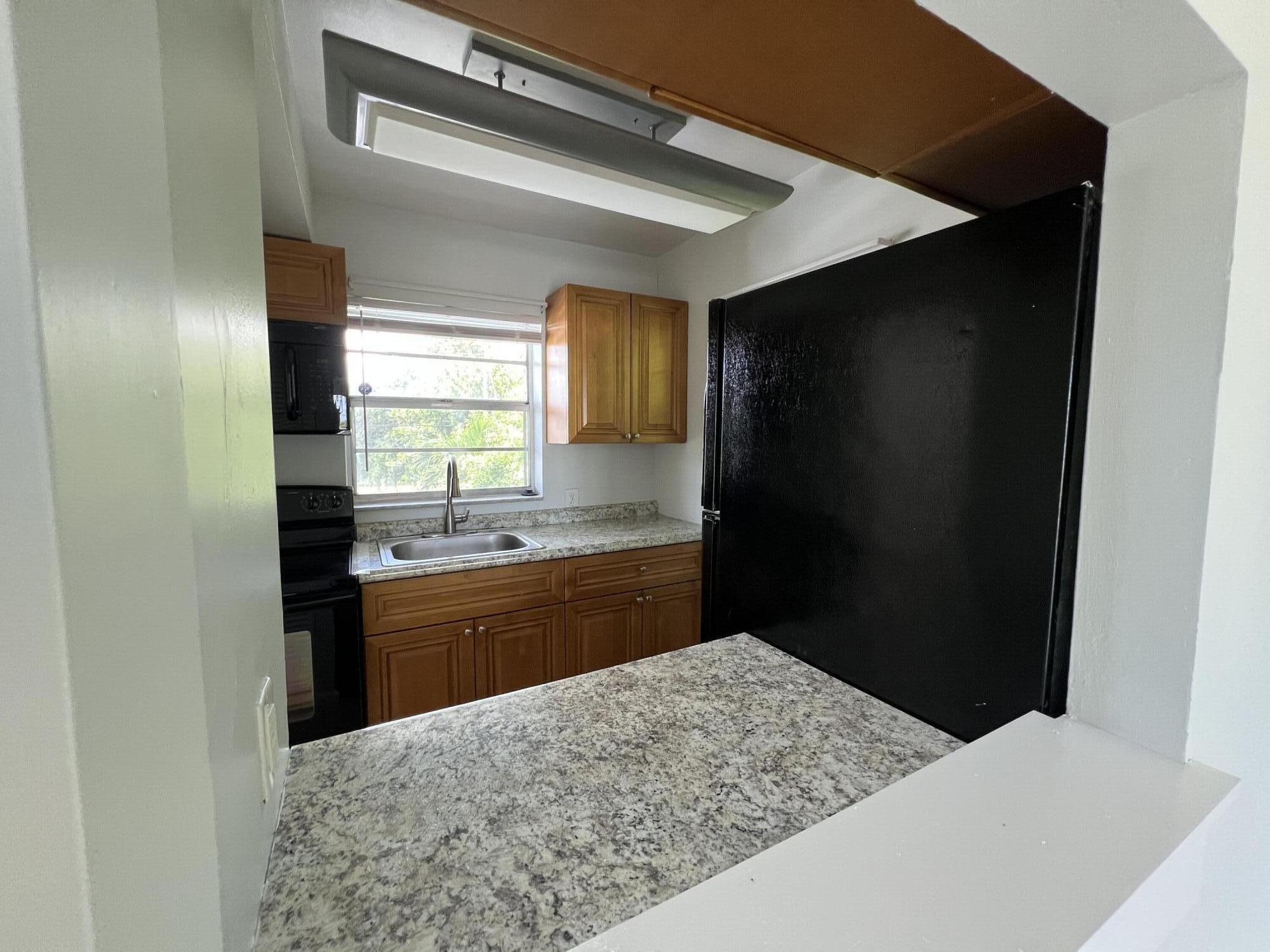 1887 Juno Road, Unit 1 North Palm Beach, FL 33408 - Photo 10 of 27 IMG_7426