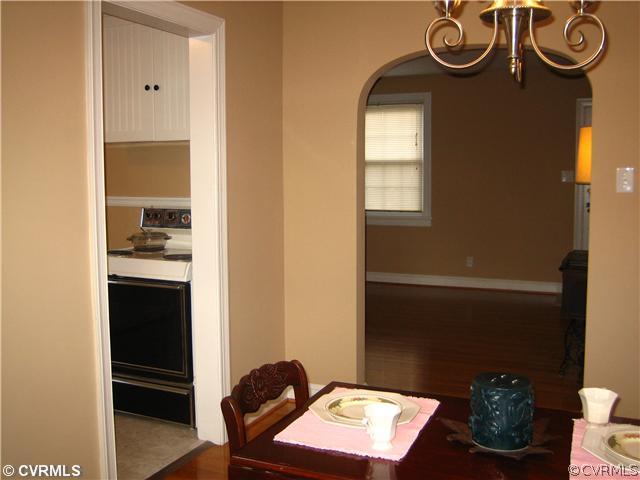 3114 Skipwith Road Henrico, VA 23294 - Photo 4 of 11 Dining Room - Arched doorway to living room, hardw