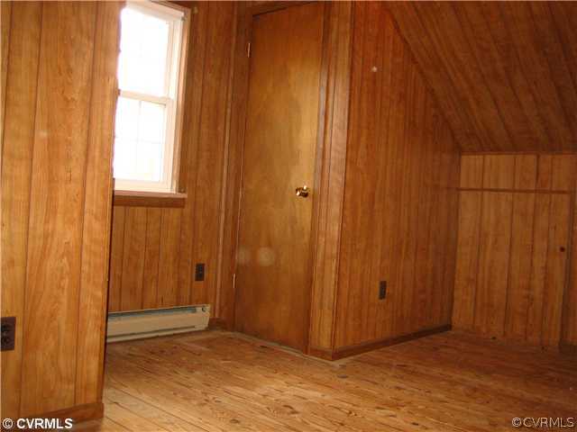 3114 Skipwith Road Henrico, VA 23294 - Photo 8 of 11 Bedroom - Hardwood flooring, paneled.