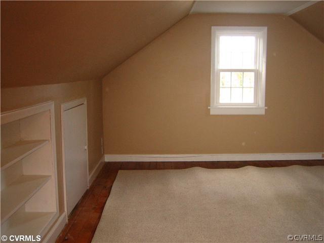 3114 Skipwith Road Henrico, VA 23294 - Photo 9 of 11 Bedroom - Built in shelving, hardwood flooring.