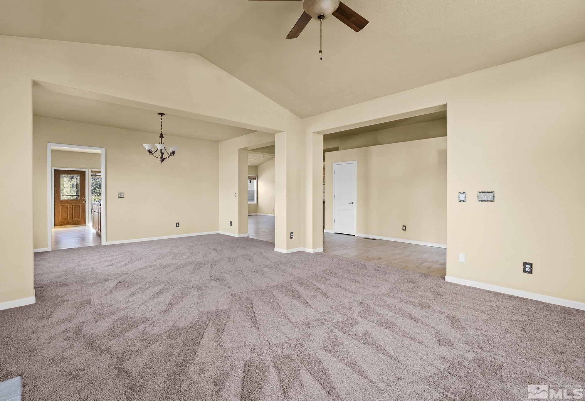 3420 Cheechako Drive Reno, NV 89519 - Photo 12 of 30 a view of an empty room and chandelier fan