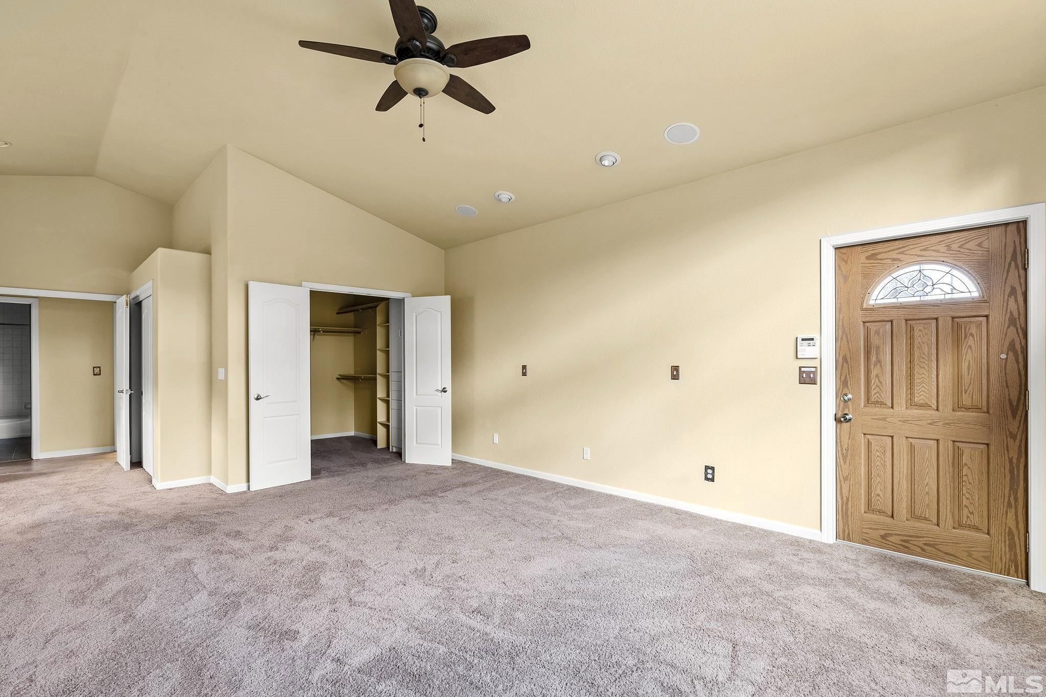 3420 Cheechako Drive Reno, NV 89519 - Photo 18 of 30 an empty room with closet and windows