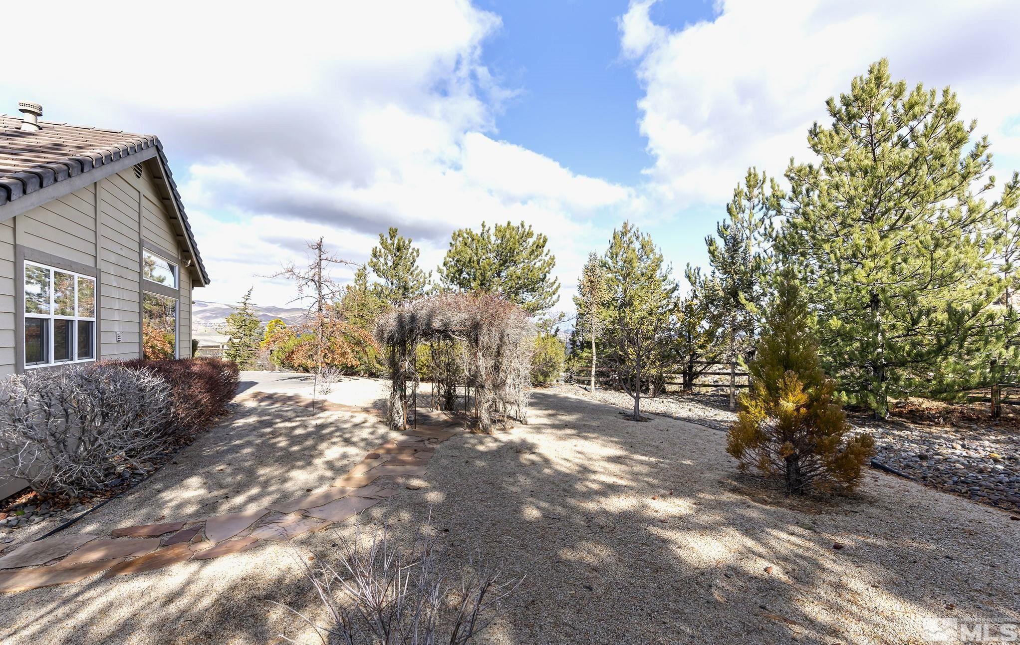 3420 Cheechako Drive Reno, NV 89519 - Photo 26 of 30 a view of a yard with plants and trees