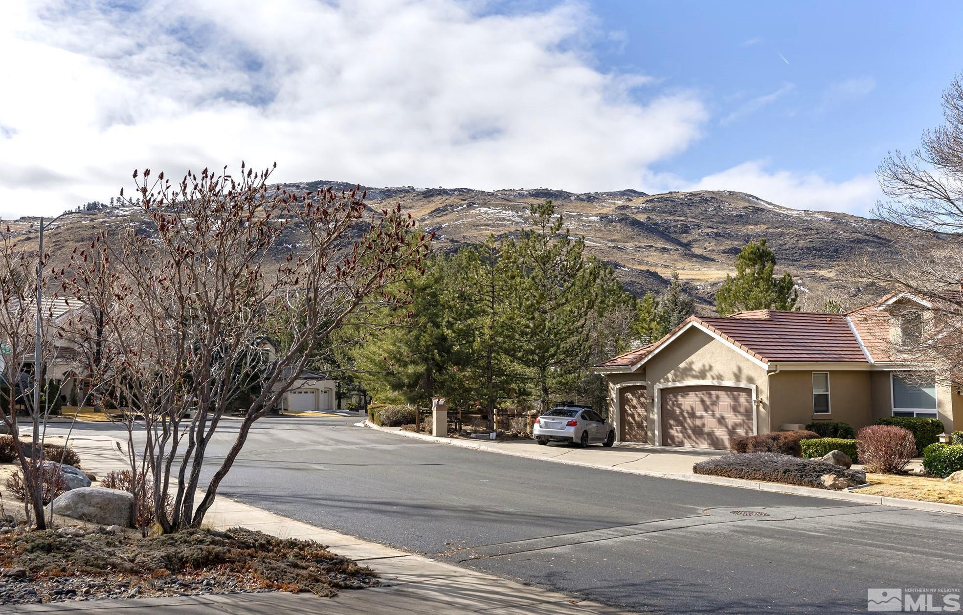 3420 Cheechako Drive Reno, NV 89519 - Photo 30 of 30 a front view of a house with a yard