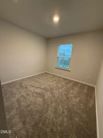 an empty room with a natural light