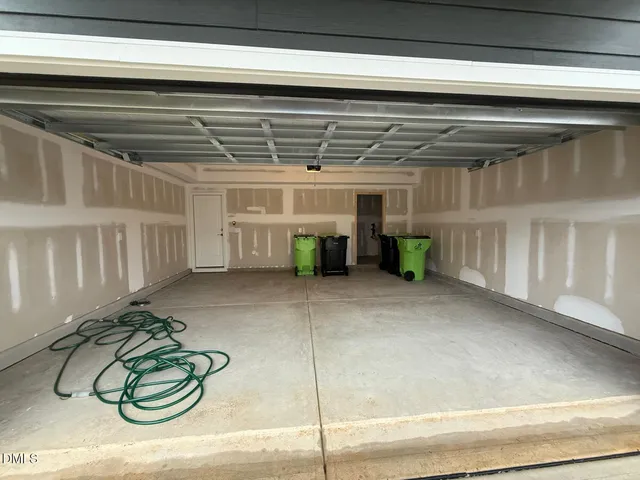 a view of a balcony with wooden floor