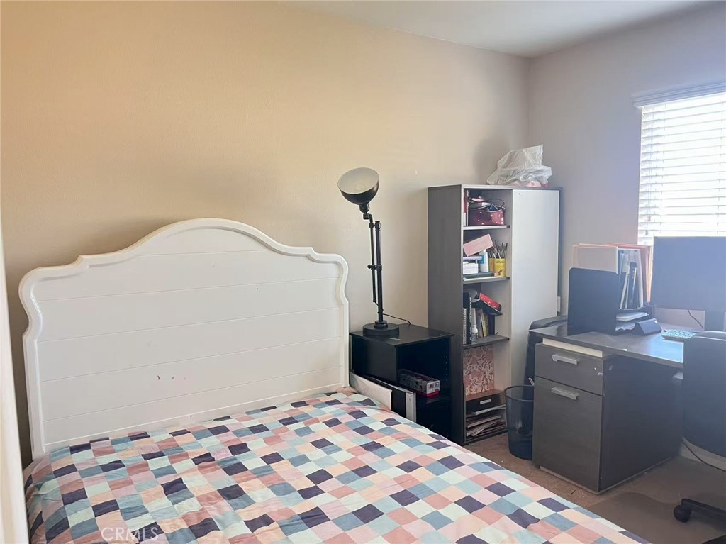 1662 Palermo Drive Riverside, CA 92507 - Photo 11 of 30 a bedroom with a bed and a dresser