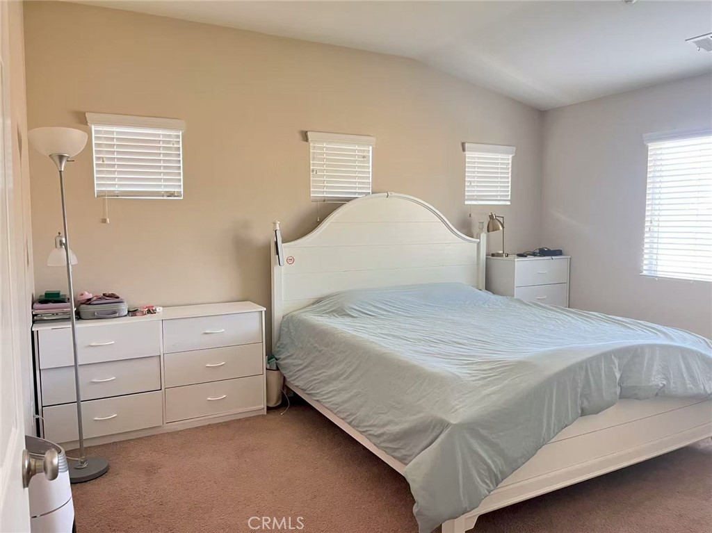 1662 Palermo Drive Riverside, CA 92507 - Photo 12 of 30 a bedroom with a bed and window