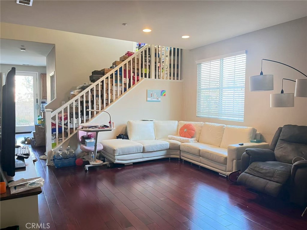 1662 Palermo Drive Riverside, CA 92507 - Photo 4 of 30 a living room with fireplace furniture and a wooden floor
