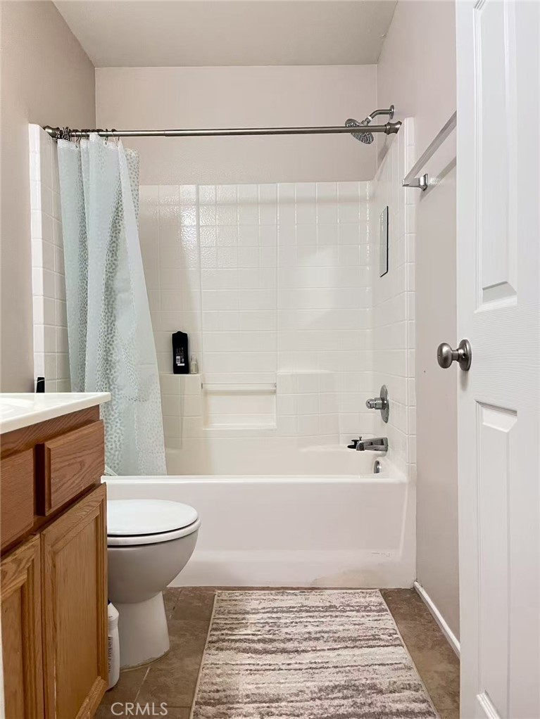 1662 Palermo Drive Riverside, CA 92507 - Photo 7 of 30 a bathroom with a toilet and a shower