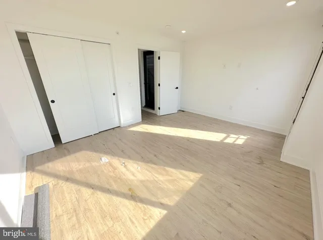 a view of wooden floor in a kitchen