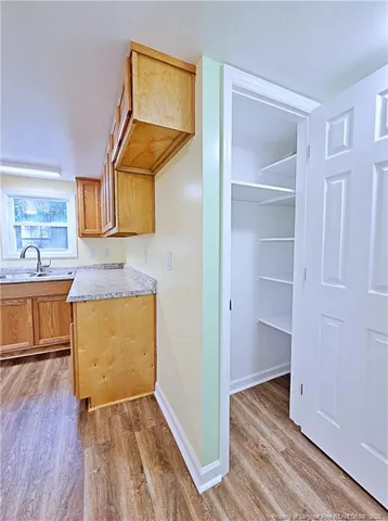 a view of kitchen and utility room