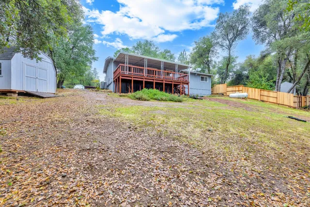 a house view with a garden space