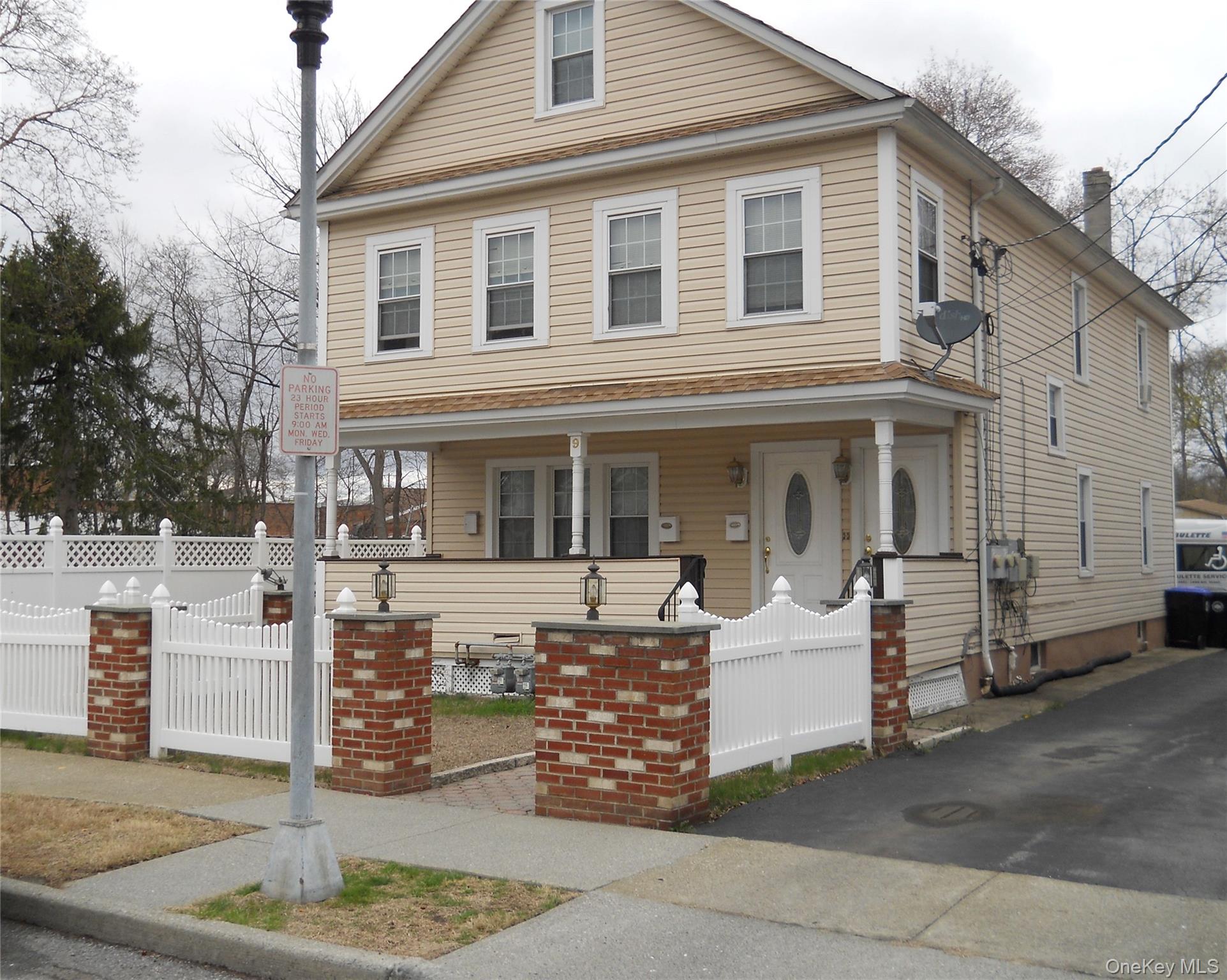 9 Lawrence Road Poughkeepsie, NY 12601 - Photo 2 of 9 a front view of a house with garden