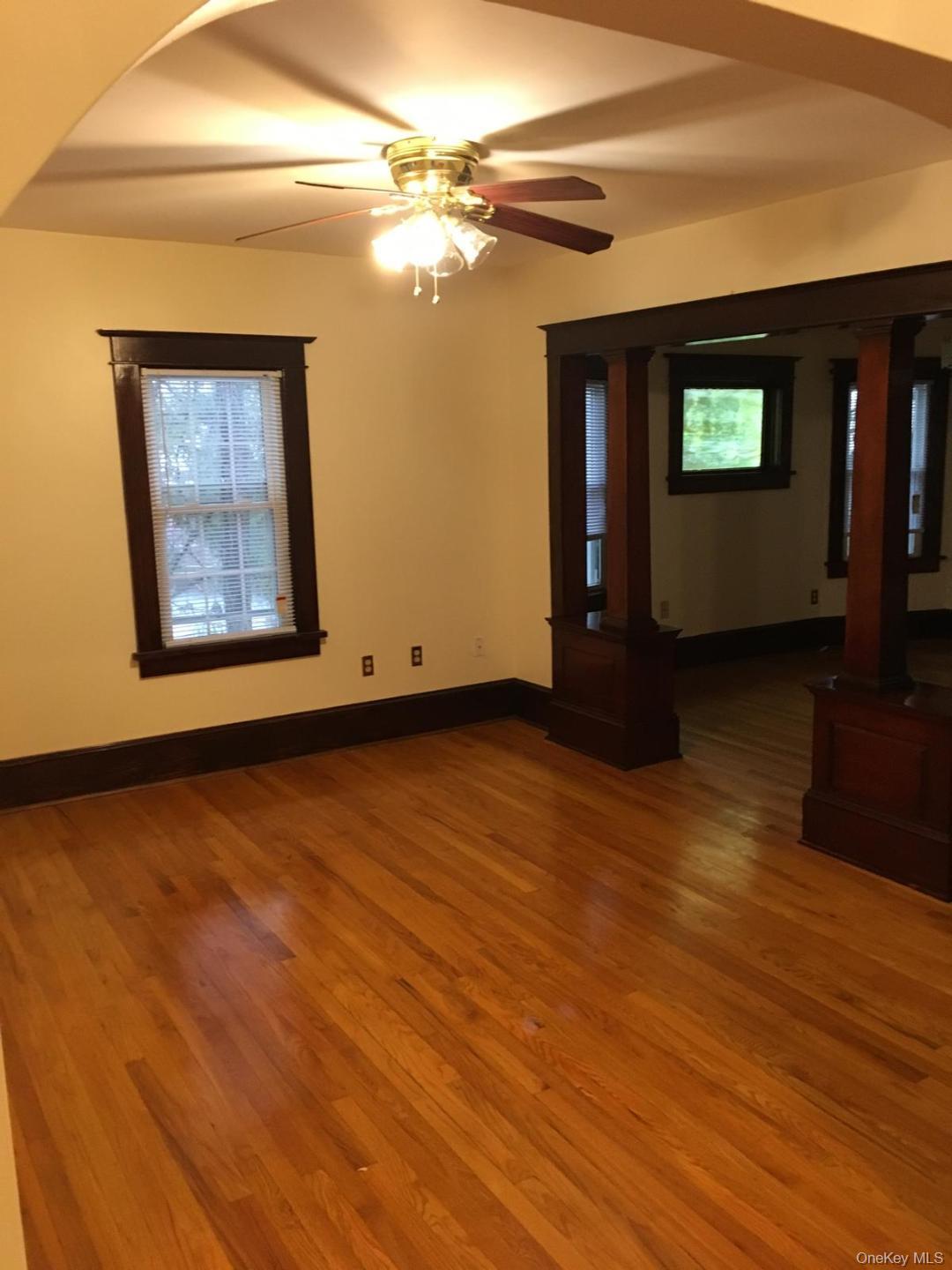 9 Lawrence Road Poughkeepsie, NY 12601 - Photo 9 of 9 a view of an empty room with window and wooden floor