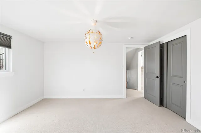 a view of a hallway with front door