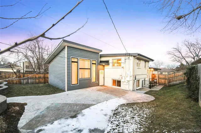 a view of backyard of a house