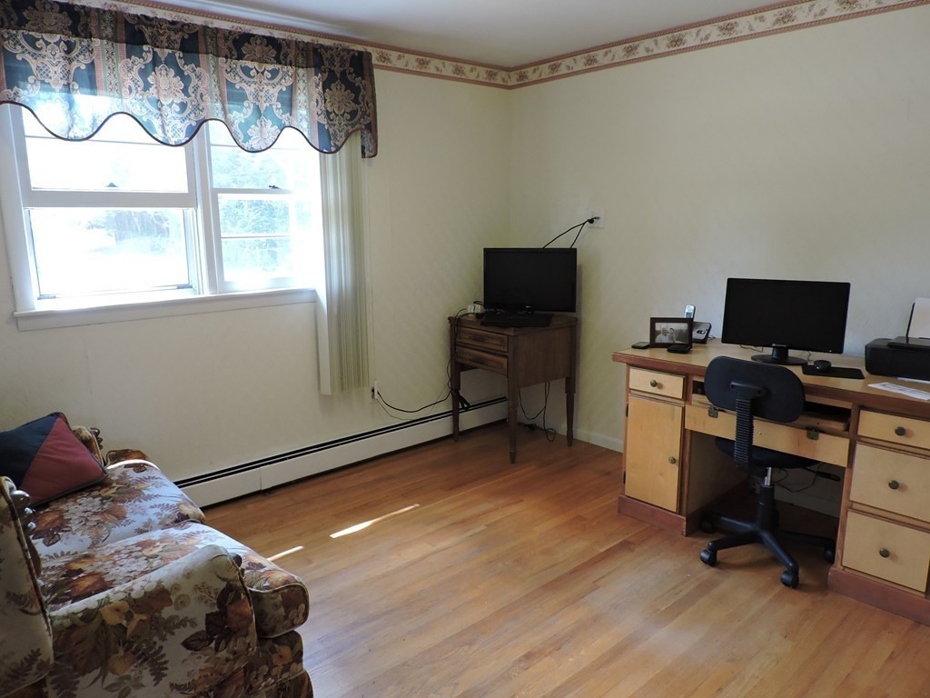 22 Palo Alto Road Springfield, MA 01128 - Photo 15 of 28 a bedroom with a bed and a desk