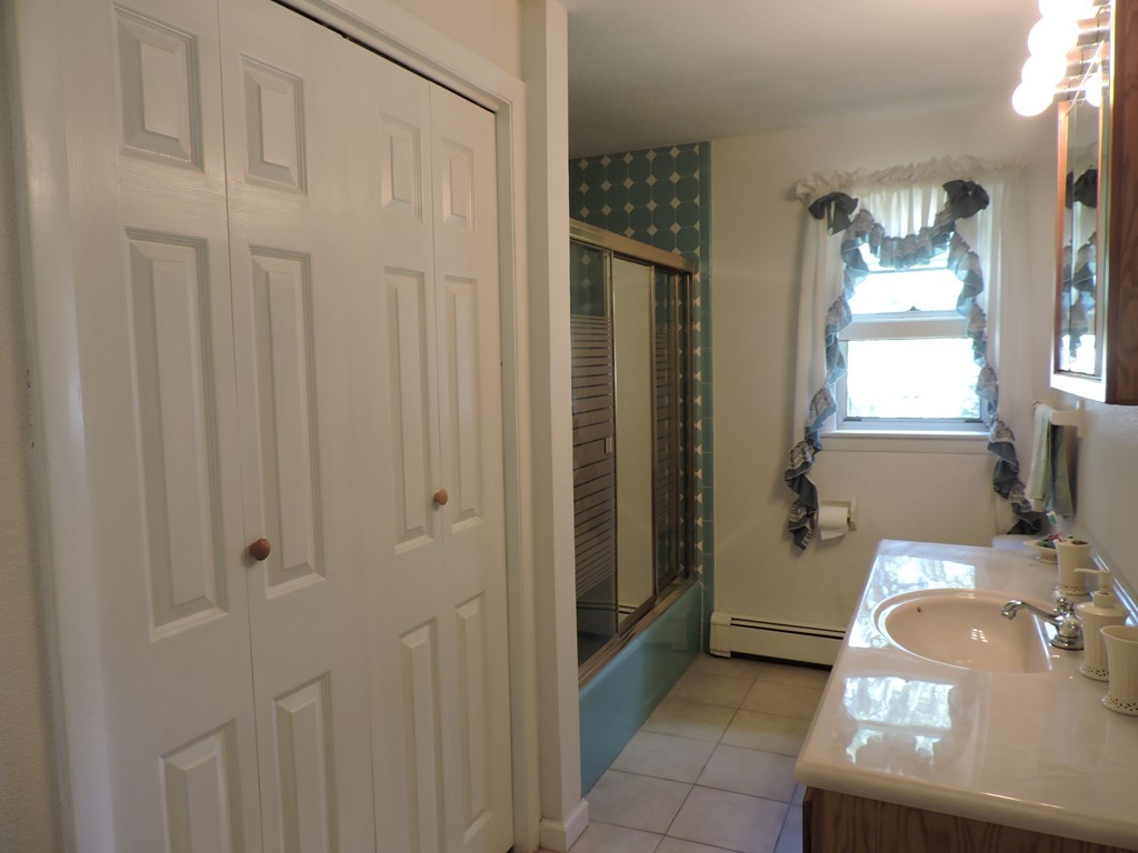 22 Palo Alto Road Springfield, MA 01128 - Photo 17 of 28 a bathroom with a sink toilet and shower