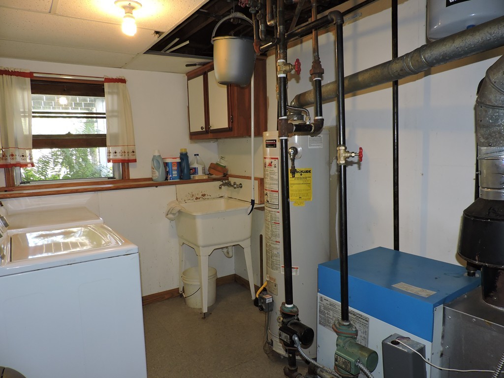 22 Palo Alto Road Springfield, MA 01128 - Photo 19 of 28 a kitchen with a sink appliances and cabinets