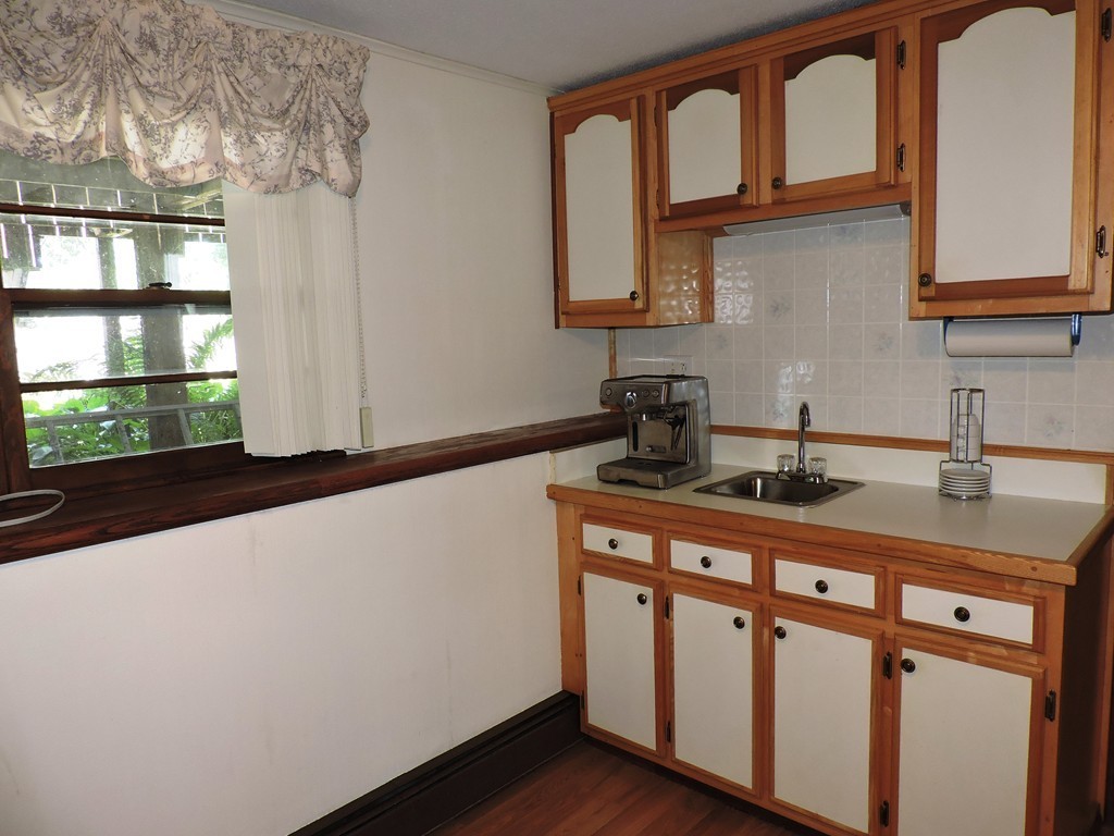 22 Palo Alto Road Springfield, MA 01128 - Photo 20 of 28 a kitchen with stainless steel appliances a sink and cabinets