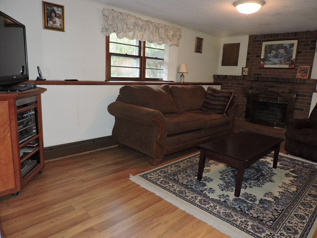 22 Palo Alto Road Springfield, MA 01128 - Photo 22 of 28 a living room with furniture and a flat screen tv