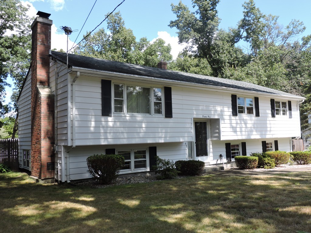 22 Palo Alto Road Springfield, MA 01128 - Photo 4 of 28 a view of a yard with a small car