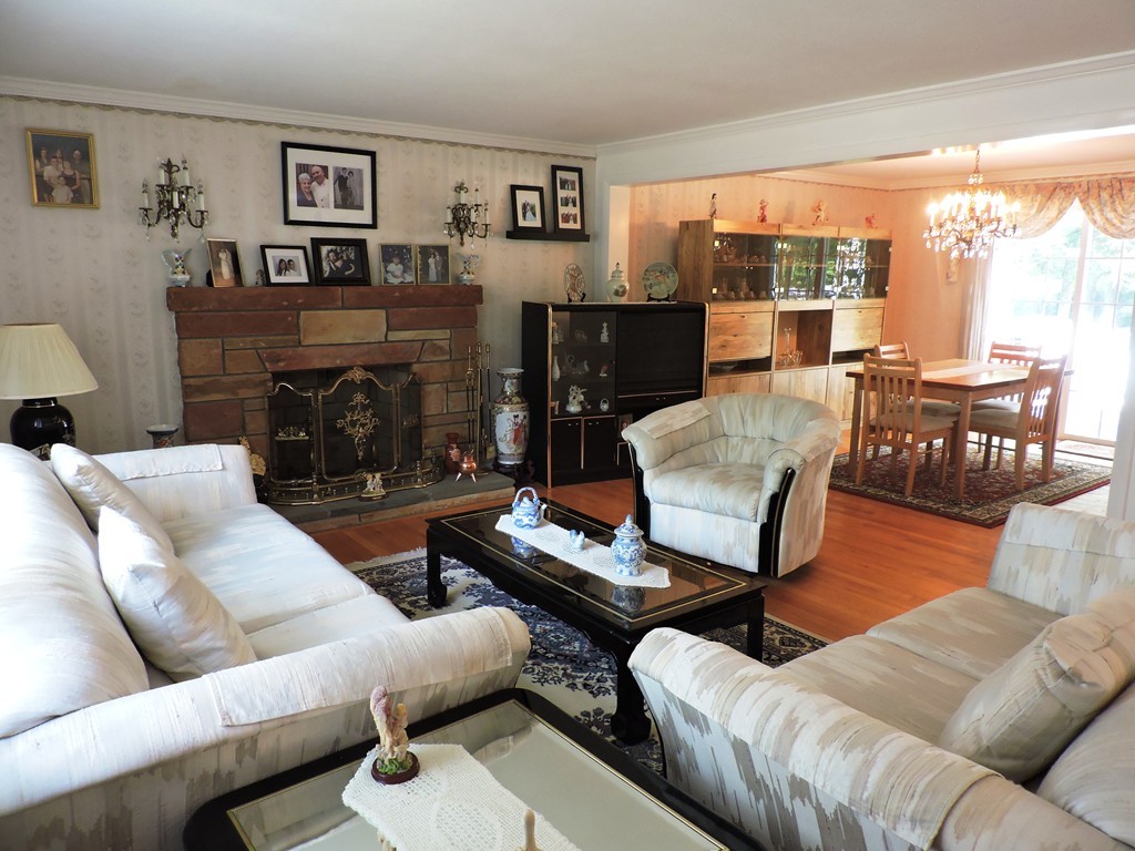 22 Palo Alto Road Springfield, MA 01128 - Photo 6 of 28 a living room with furniture and a fireplace