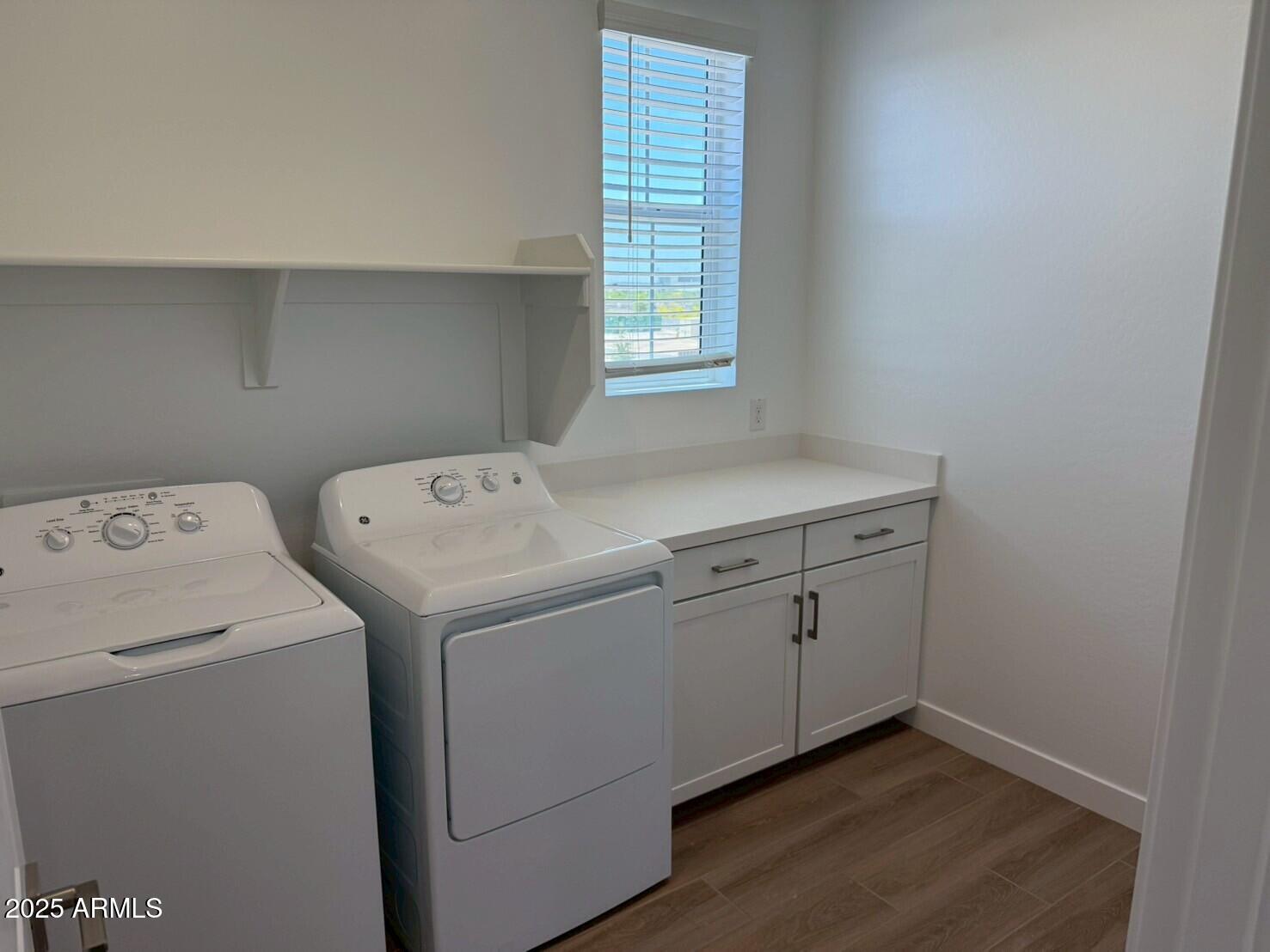 2443 West Rowel Road Phoenix, AZ 85085 - Photo 15 of 19 a utility room with dryer and washer