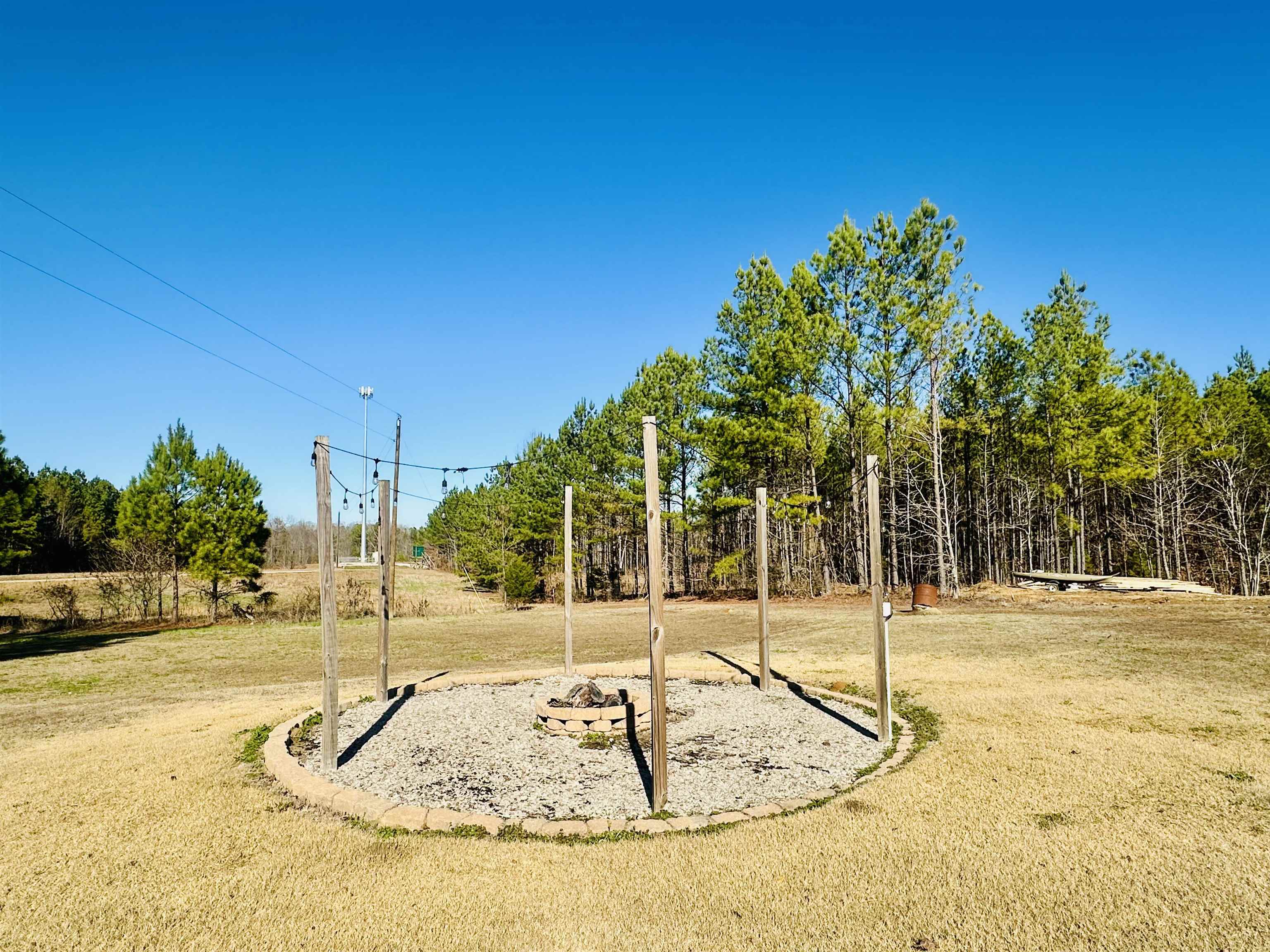 3566 Highway 142 Selmer, TN 38375 - Photo 11 of 20 View of playground with a lawn