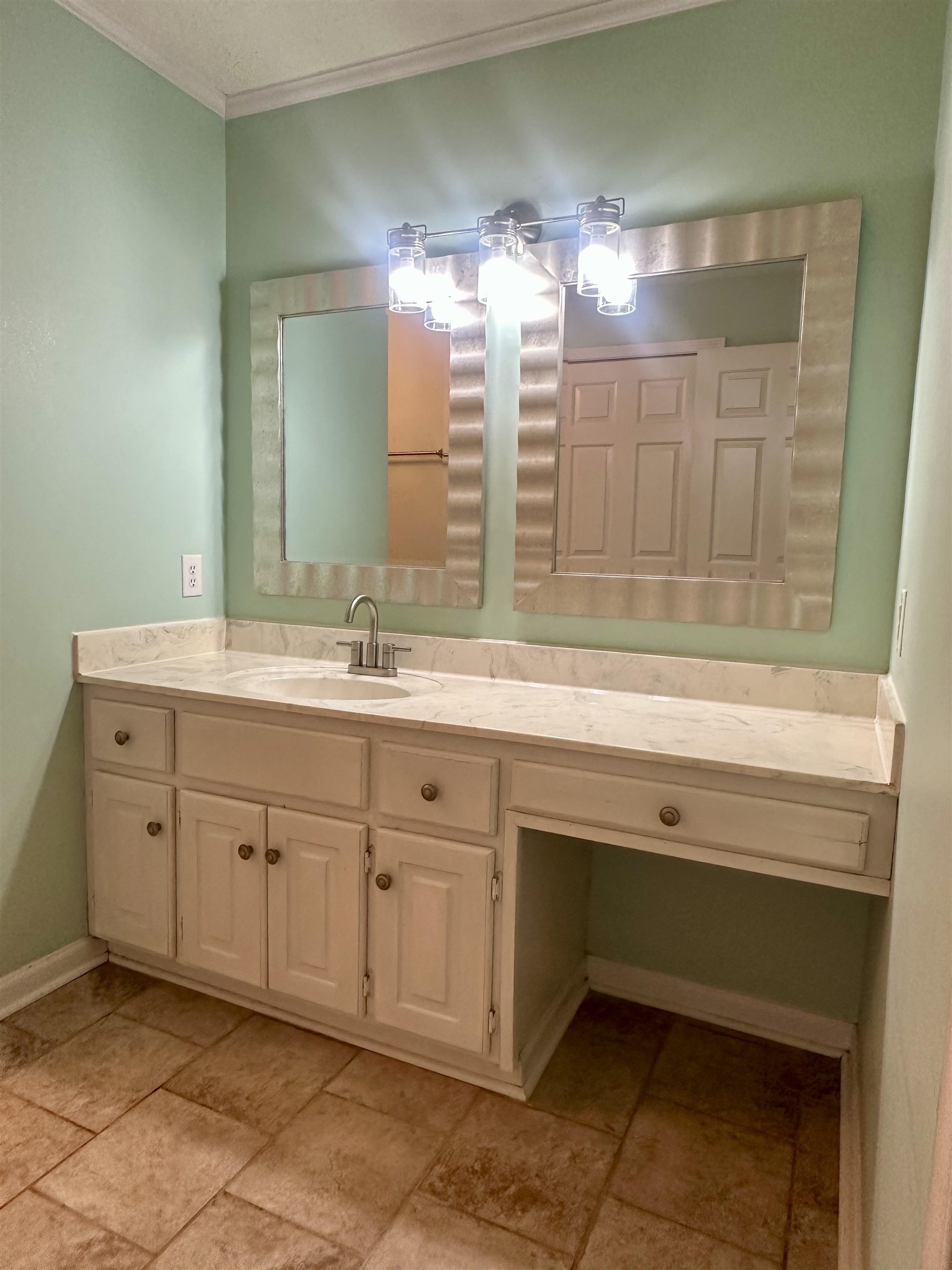 3566 Highway 142 Selmer, TN 38375 - Photo 9 of 20 Bathroom featuring vanity, ornamental molding, and stone tile floors