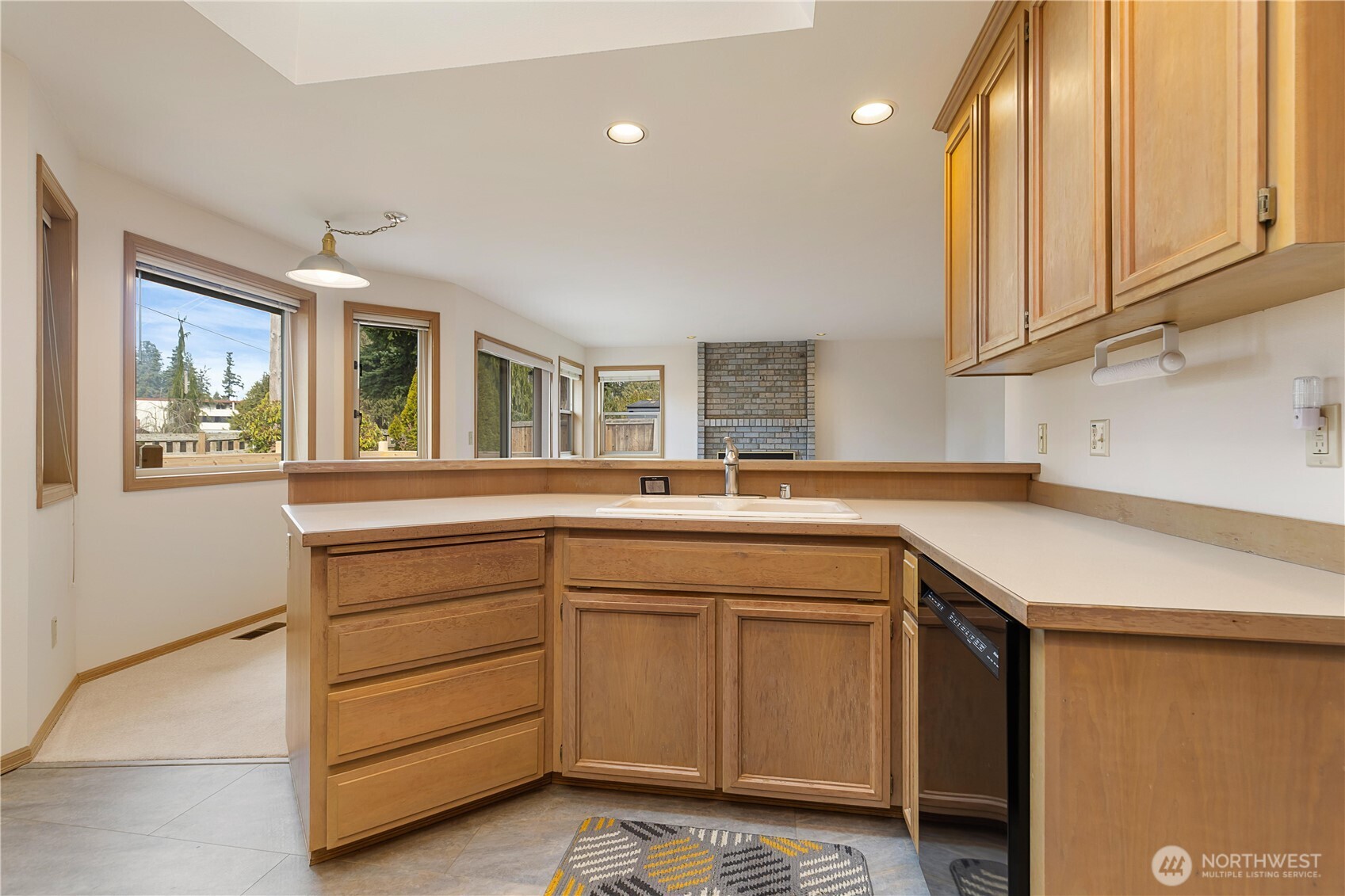 8523 199th Place Southwest Edmonds, WA 98026 - Photo 15 of 40 a kitchen with a sink and cabinets