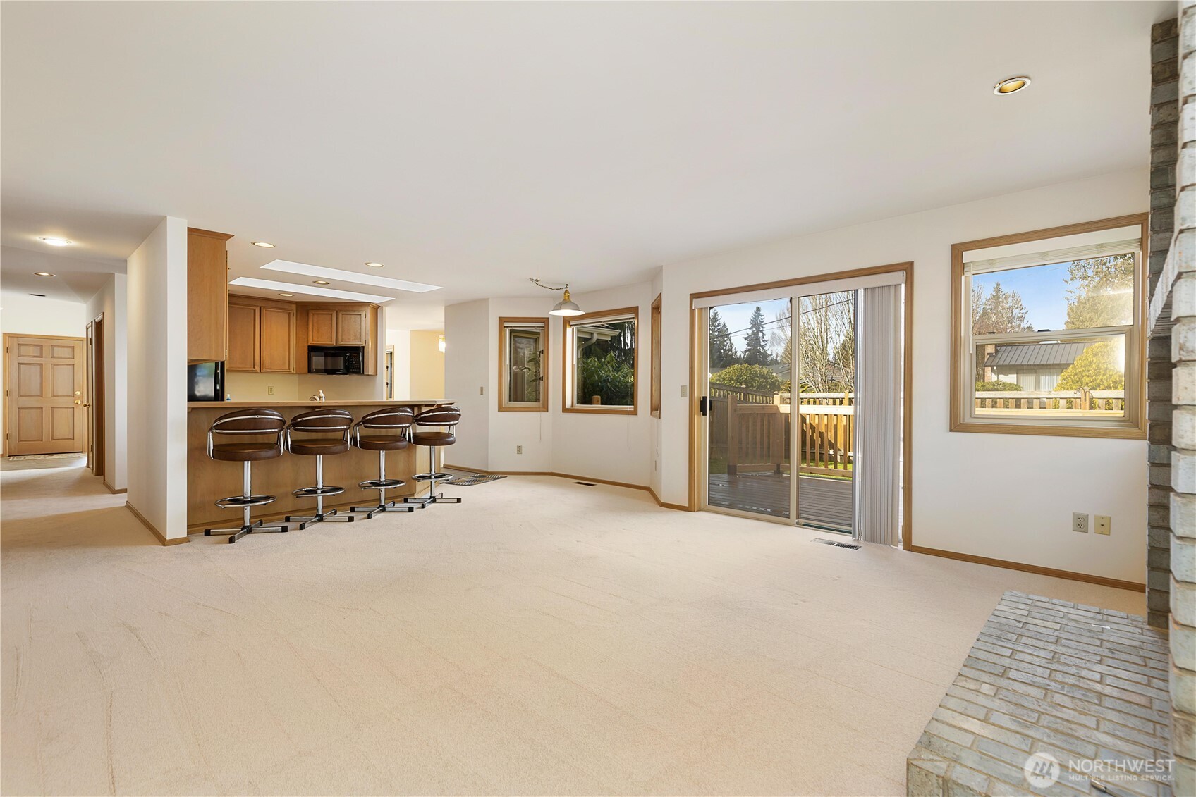 8523 199th Place Southwest Edmonds, WA 98026 - Photo 21 of 40 a view of a livingroom with furniture and a flat screen tv