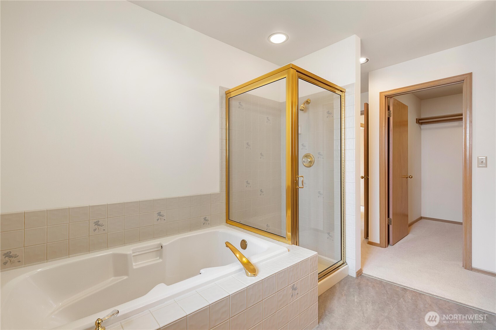 8523 199th Place Southwest Edmonds, WA 98026 - Photo 24 of 40 a bathroom with a tub and a shower