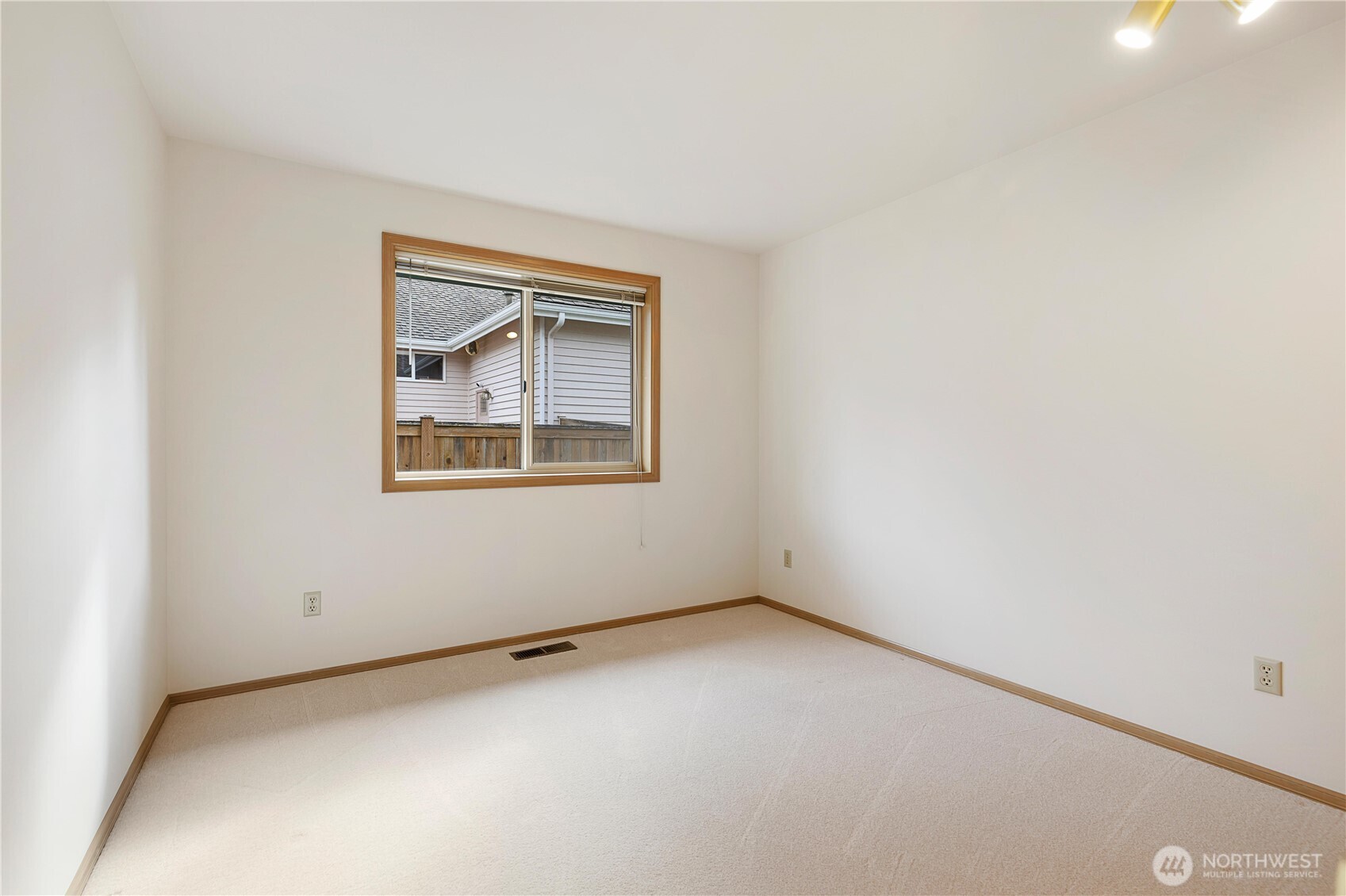 8523 199th Place Southwest Edmonds, WA 98026 - Photo 27 of 40 an empty room with a window