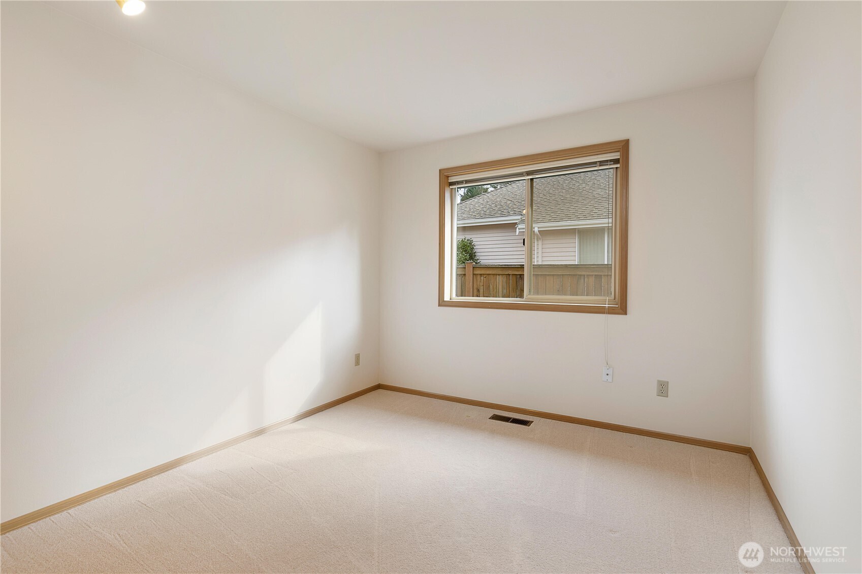 8523 199th Place Southwest Edmonds, WA 98026 - Photo 28 of 40 an empty room with a window