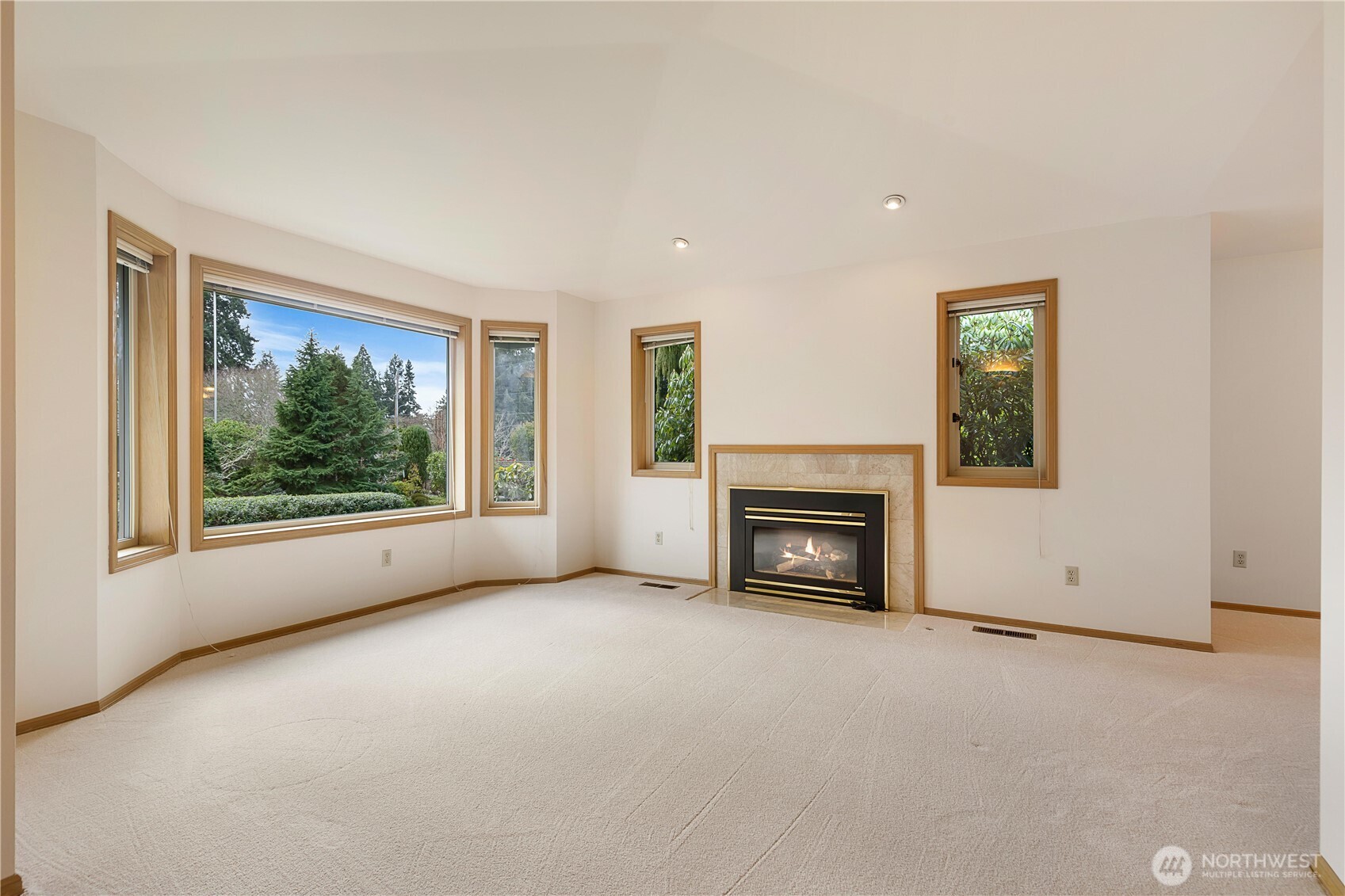 8523 199th Place Southwest Edmonds, WA 98026 - Photo 7 of 40 a view of empty room with furniture and a fireplace