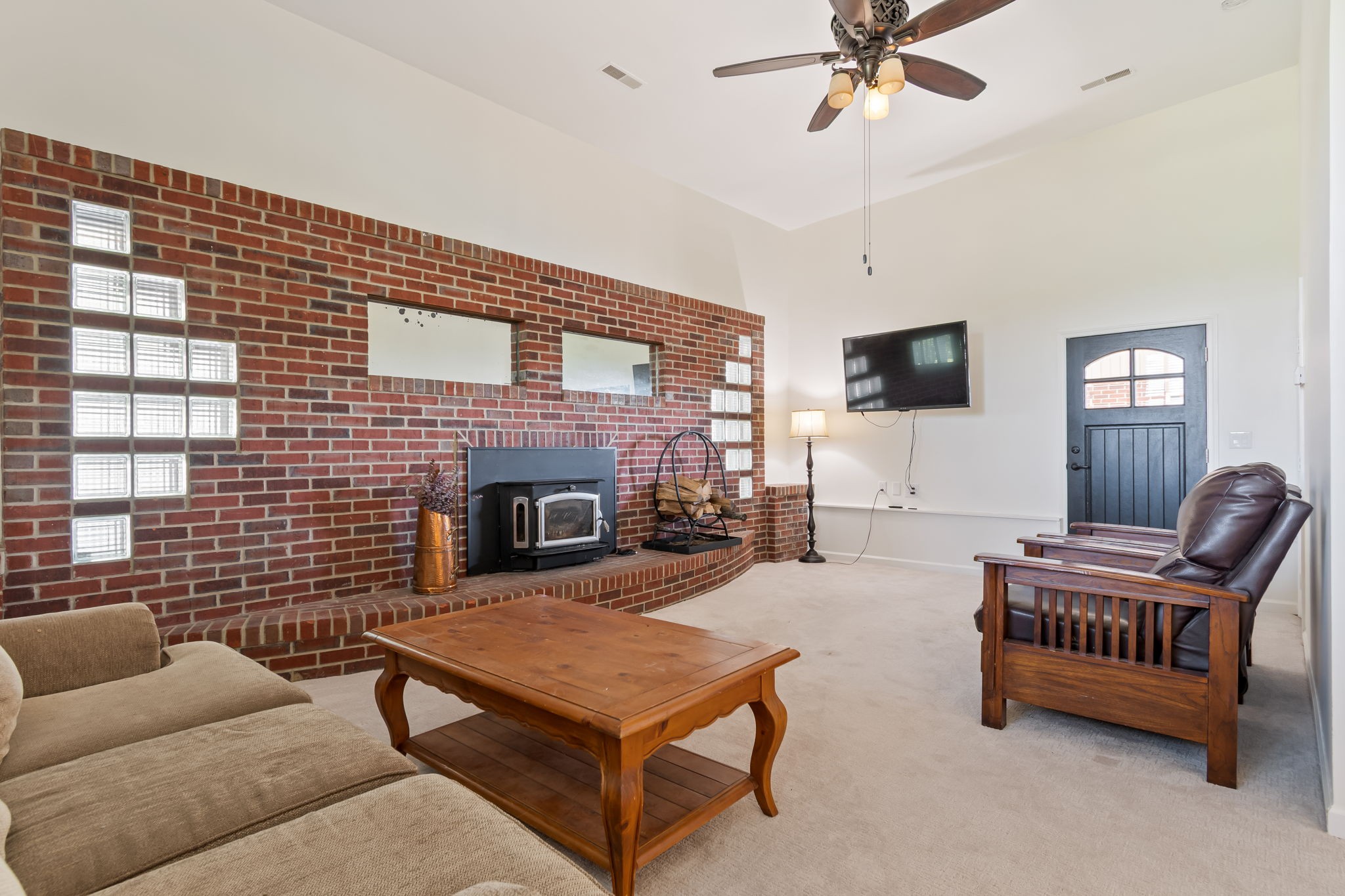1979 Buck Daniels Road Culleoka, TN 38451 - Photo 28 of 61 a living room with furniture and a fireplace