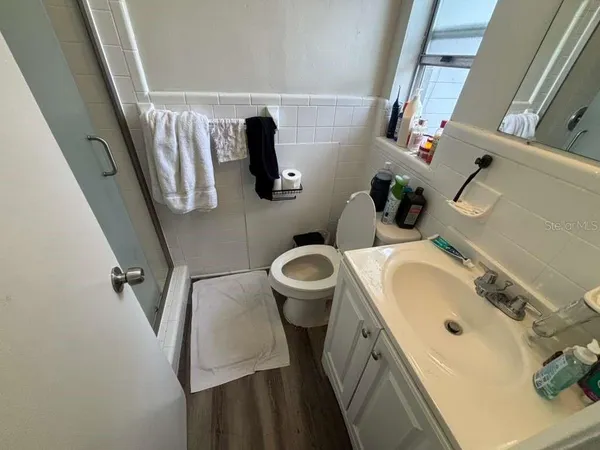a bathroom with a sink and mirror